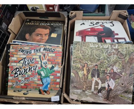 Two boxes of vinyl LP records, rock, pop, jazz, motown &amp; country including Buddy Holly, Bread, Jive Bunny, Chuck Berry, T