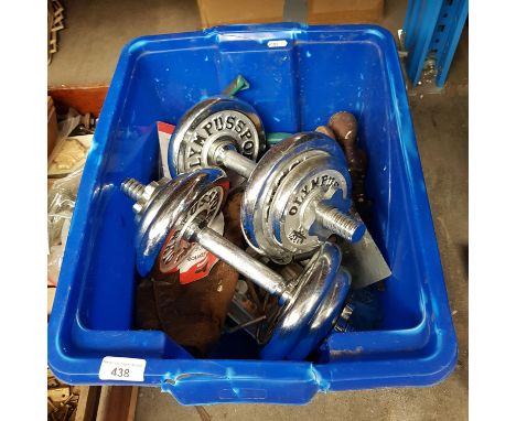 A box of exercise weights and a box of tools 
