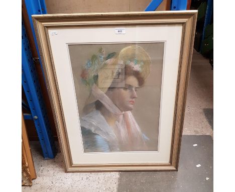 20th century school, pastel portrait of a woman, 38cm x 55cm, unsigned, framed and glazed, 60cm x 78cm.