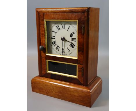 Small American Seth Thomas walnut cased time piece mantel clock with Roman numerals to the face.(B.P. 21% + VAT) Good conditi