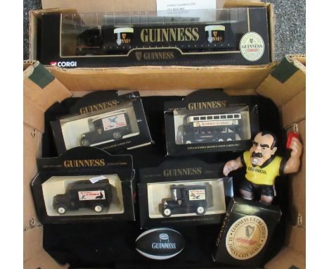Box of Guinness memorabilia to include; a Corgi Classics Guinness Curtainside diecast scale model truck, various diecast Guin