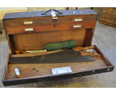 Vintage stained carpenters toolbox, the interior revealing assorted tools; saws etc, with pull out drawers. (B.P. 21% + VAT) 