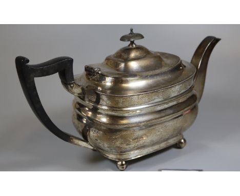 Early 20th Century silver teapot with ebonised handle and finial, London hallmarks. Total weight 22 troy ozs approx.(B.P. 21%