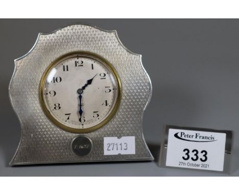 Early 20th century silver engine turned eight day Swiss made easel clock dated 1-1-27.(B.P. 21% + VAT) 