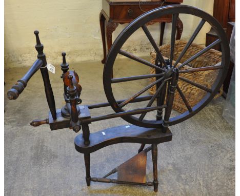 Stained vintage spinning wheel with treadle base.(B.P. 21% + VAT) 