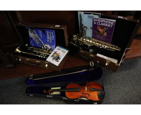 Modern student alto saxophone in original box, a Chinese students violin in hard case and a student trumpet in hard case. (3)