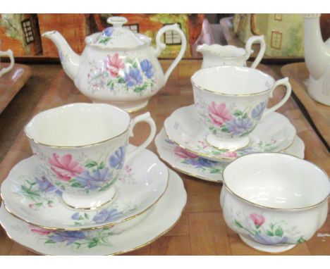 Tray of Royal Albert 'Friendship' series 'Sweet Pea' design English bone china floral teaware to include; two trios, teapot, 