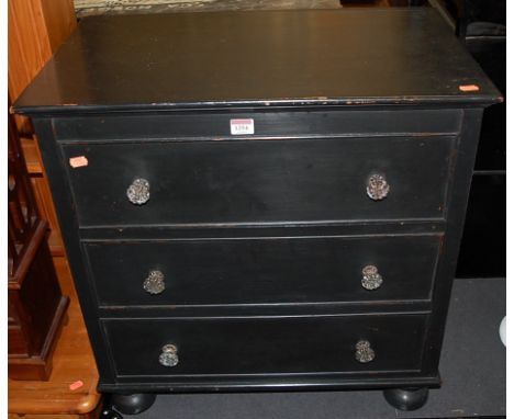 A painted hinge top commode in the form of a chest, width 65cm