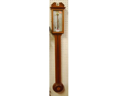 A reproduction mahogany and chequer strung stick barometer, having a silvered dial, 99cm