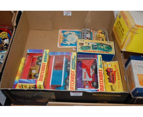 One box containing seven various boxed and carded Matchbox diecast models, to include a Kingsize K5 racing car transporter, N