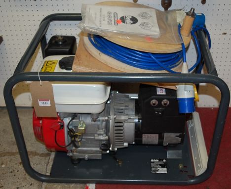 A Belle Minigen 2000 portable generator, having a Honda engine