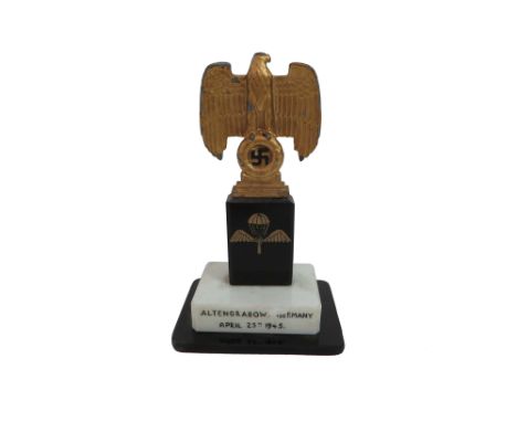 German SOE Captured Commemorative Desk Ornament cast alloy gold painted eagle and swastika mounted on a black and white marbl