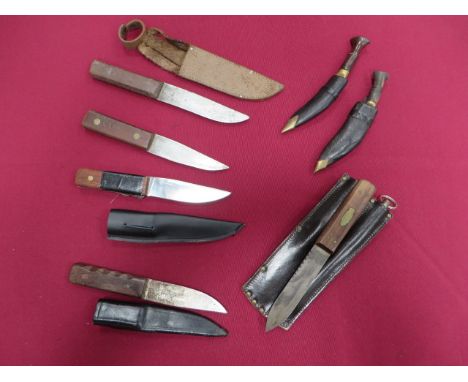 Five Various Navy Pattern Deck Knives consisting single edged blade etched 'The Sailor's Friend'. Wooden slab grip. Contained