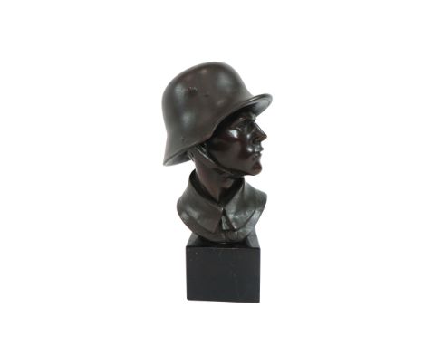 Imperial German Bronzed Statue green coloured helmet and tunic.  Bronze head.  The rear marked 'A Zauche Weimar'.  Mounted on