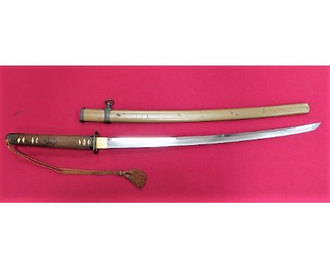 Late 1944 Army Officer's Shin Gunto Sword 27 1/4 inch single edged blade with narrow hammon. Brass habaki. Tang with characte