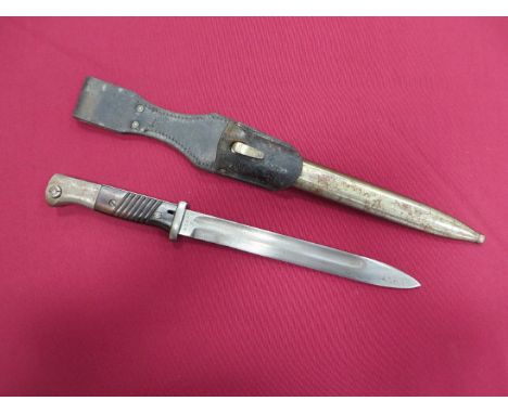 WW2 German K98 Bayonet 9 1/2 inch single edged blade. Large fuller. The forte marked '41 COF'. Steel crossguard. Steel pommel