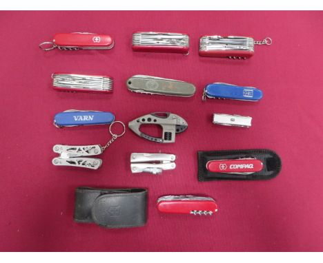 Selection of Swiss Style Multi Blade Knives consisting 6 x multi blade examples with red slab grips. One marked 'Compar' ... 