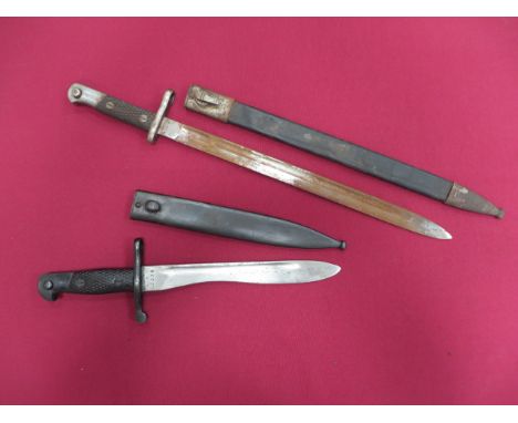 Two Spanish Bayonets consisting M1893 bayonet. 15 3/4 inch single edged blade with fuller. The forte marked 'Artilleria de To