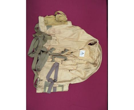 RAF 1941 Pattern Yellow Mae West yellow drill material vest. Dark yellow canvas double light pocket to the right side. Left c
