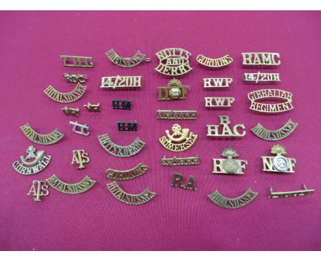 Selection of Brass Shoulder Titles including 7 x Royal Sussex ... 2 x Gordons ... Notts & Derby ... Notts and Derby ... 7DG .