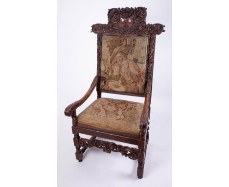 A 19th Century carved walnut high back arm chair with tapestry covers, height 132cm, Provenance; Robert Lenkiewicz Studio Auc