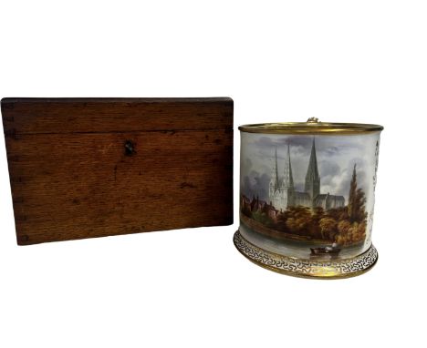 A large porcelain porter mug, possibly Worcester in fitted oak case. Hand painted cathedral scene with river & boat. Good all