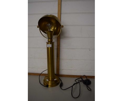 A retro styled brass desk lamp