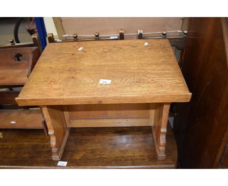 Ecclesiastical style light oak book or bible stand with carved decoration