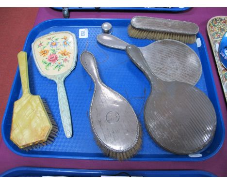 Hallmarked Silver Backed Hand Mirrors, engine turned brushes and a hallmarked silver bottle/jar top (no jar):- One Tray