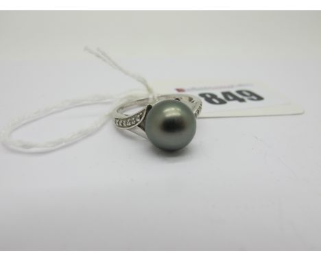 A Modern 9ct White Gold Black Pearl Dress Ring, (finger size O).