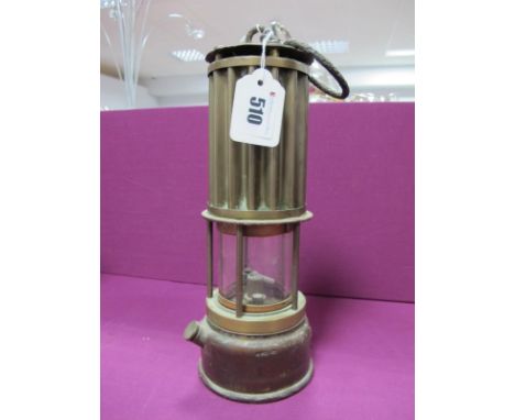 The Premier Lamp of Leeds Miners Lamp, having vertical ribbed upper body, 27cm high with suspension loop down.