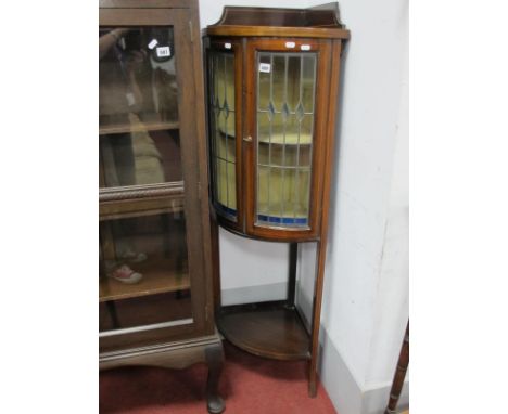 Edwardian Inlaid Mahogany Freestanding Corner Cabinet, with low back, lead glazed doors to cylinder front, over single shelf,