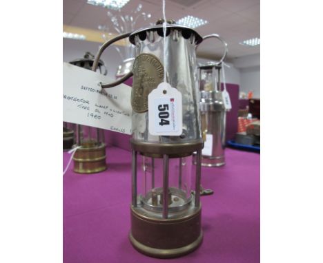 Protector Lamp &amp; Lighting, Eccles, Type SL M&amp;Q Miners Lamp, stamped '60', circa 1959, 24cm high with suspension hook 