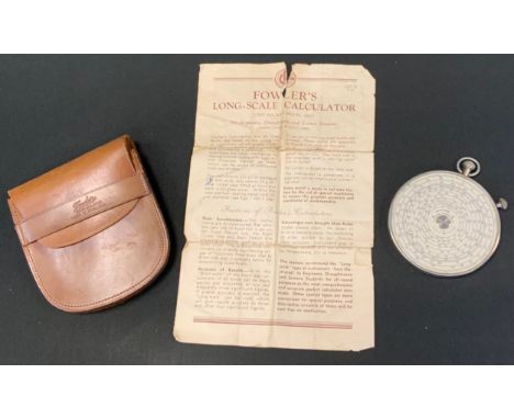 An early 20th century Fowlers Universal Calculator, Fowler &amp; Co Manchester, leather case with original instruction leafle