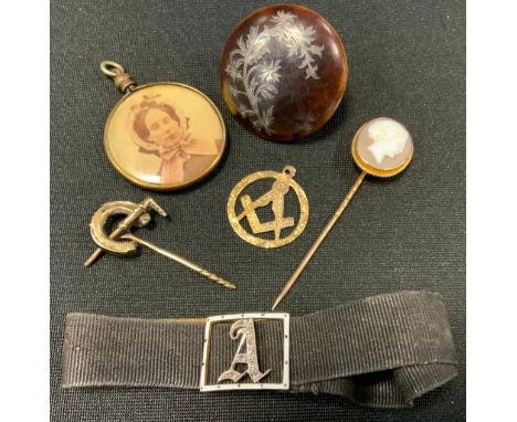 A 9ct gold Masonic pendant, 1.9g;  Victorian portrait pendant;  a Victorian  enamelled and diamond chip A on woven black band