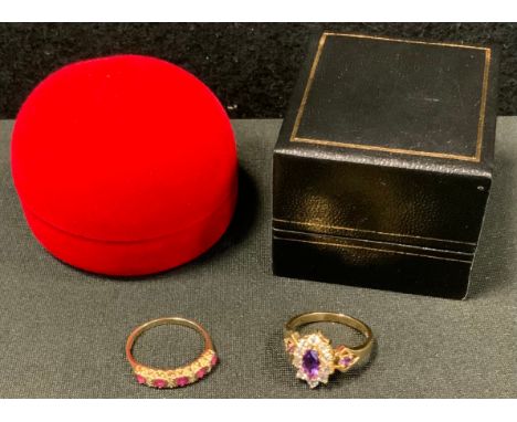 Rings - a diamond and ruby line ring, alternate set with five deep red rubies and four diamonds, 9ct gold shank, size M, 1.6g