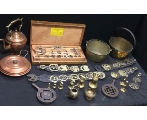 Metalware  - a set of six Victorian bell weights;  preserve pans, horse brasses;  cast iron trivet;  Tools tap and die set et