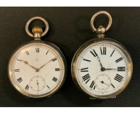 An early 20th century Omega silver cased open face pocket watch, bold Roman numerals, minute track, subsidiary seconds, spade