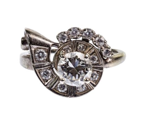 Orange Blossom 18k White Gold and Diamond Ring  Having a central round cut diamond weighing approximately 0.94 carats (6.41mm