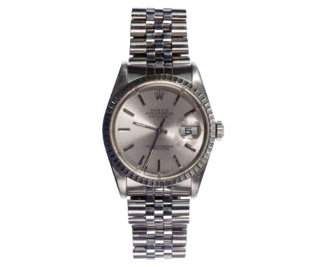 Rolex Oyster Perpetual Datejust Wristwatch  Serial #E113908 case #16220 having a fluted bezel, silver tone dial, stick indexe