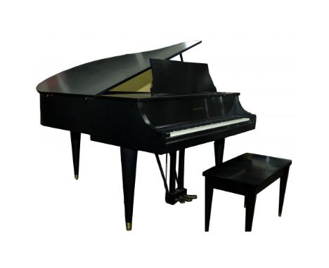 Baldwin Model 'M' Baby Grand Piano  Serial #170136 dating to 1965, ebony finish on square tapered legs; together with matchin