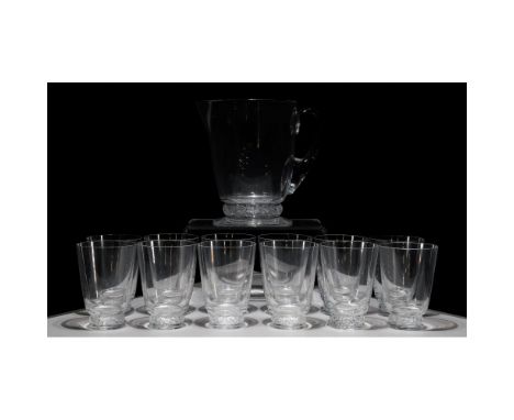 Lalique 'St. Hubert' Crystal Collection  (13) items including (12) tumbler glasses and pitcher, having frosted leaves motif a