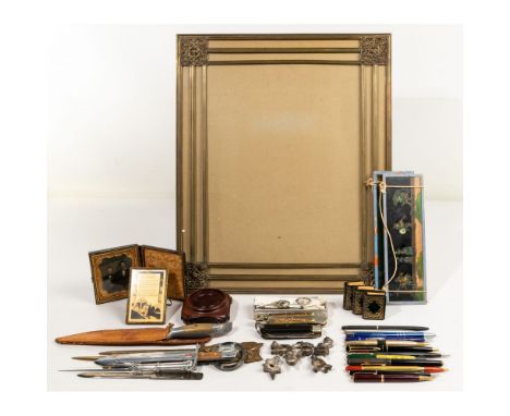 Desk Accessory Assortment  Approximately (23) items including (6) letter openers with one having a magnifying glass, pens by 
