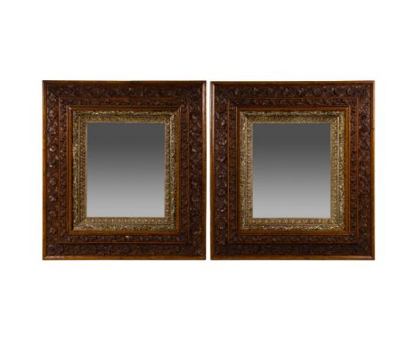 Tudor Style Mirrors  (2) Victorian beveled mirrors in carved oak frames having a carved and gilt liner held in place on rever