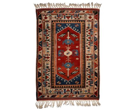 Persian Wool Rug  Abstract floral pattern in center having a village woven into the borders in hues of blue, white, tan and r