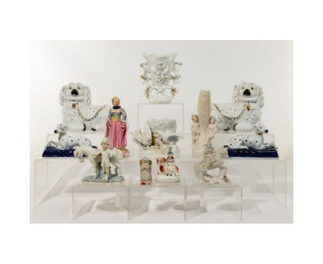 Porcelain Figurine and Vase Assortment  (12) items without maker marks including pairs of recumbent dogs; an enamel painted f