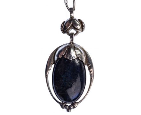 Georg Jensen Silver and Blue Hard Stone Pendant on Necklace  Model 54 having a leaf form cradling an oval cut cabochon labrad