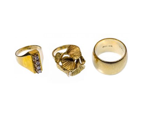 18k Yellow Gold Ring Assortment  (3) rings including (1) with round cut diamonds, (1) gold band and (1) with a flower design;