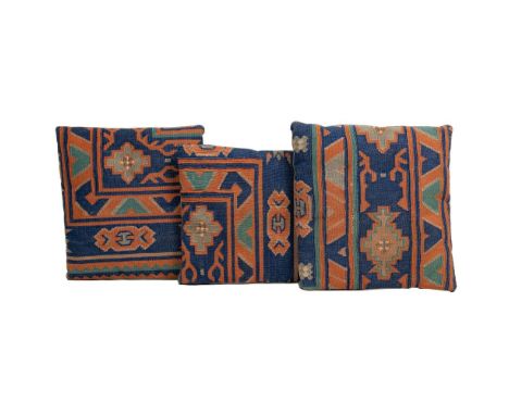Rug and Pillow Assortment  (4) items including a mercerized cotton area rug having an abstract floral print in hues of rust, 