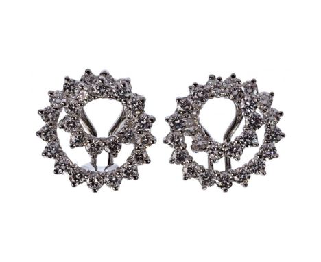 Tiffany &amp; Co Platinum and Diamond Clip-on Earrings  Continuous double circle having round cut diamonds weighing approxima